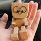 Figurine en bois charmante – 12 expressions faciales